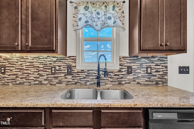 48 Manito Pl, Clayton, NC 27520 - kitchen featuring dark brown cabinets, dishwasher, and tasteful backsplash