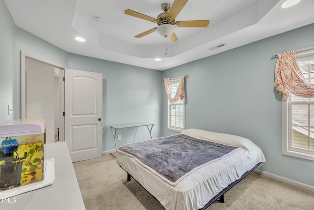 48 Manito Pl, Clayton, NC 27520 - carpeted bedroom with recessed lighting, a raised ceiling, and a ceiling fan