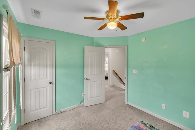 48 Manito Pl, Clayton, NC 27520 - unfurnished bedroom featuring carpet and a ceiling fan