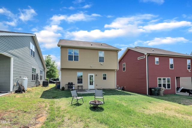 48 Manito Pl, Clayton, NC 27520 - rear view of house with a fire pit and a yard