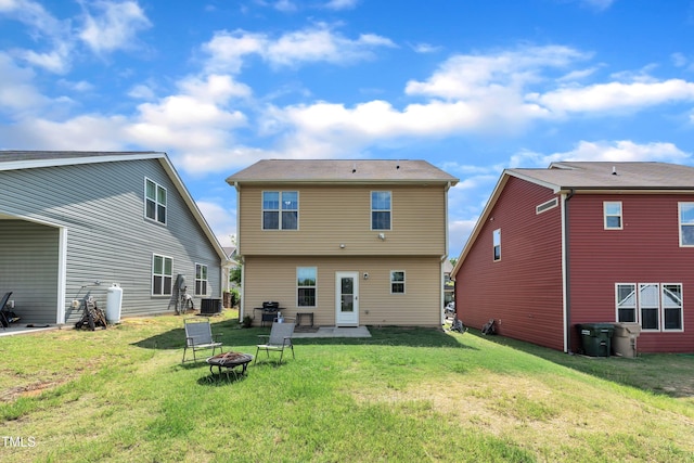 48 Manito Pl, Clayton, NC 27520 - rear view of property featuring a yard and an outdoor fire pit