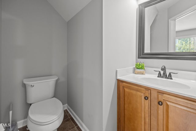 112 Autumn Ridge Dr, Knightdale, NC 27545 - half bathroom featuring vanity, tile patterned flooring, and lofted ceiling