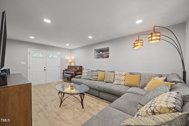 112 Autumn Ridge Dr, Knightdale, NC 27545 - living area featuring light wood-style flooring and recessed lighting