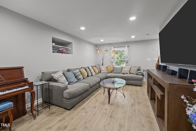 112 Autumn Ridge Dr, Knightdale, NC 27545 - living room with light wood-style floors and recessed lighting