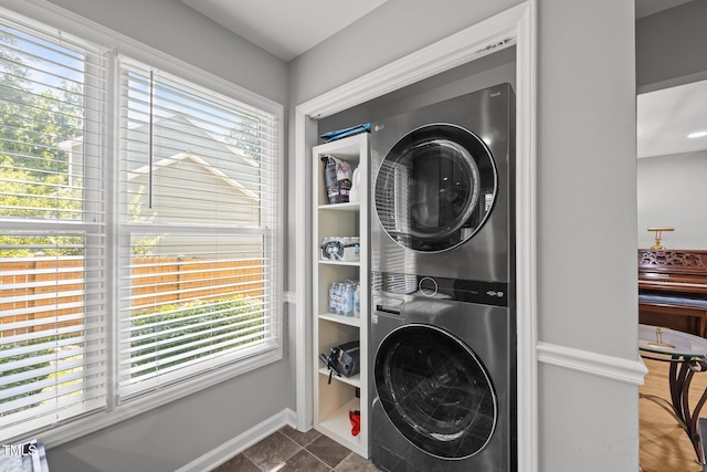 112 Autumn Ridge Dr, Knightdale, NC 27545 - laundry room with estacked washer and dryer and healthy amount of natural light