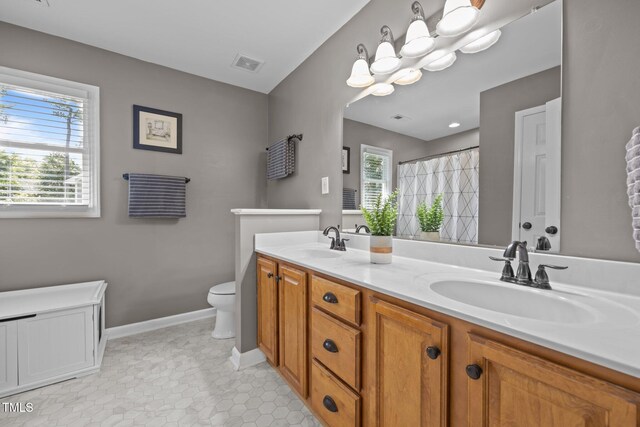 112 Autumn Ridge Dr, Knightdale, NC 27545 - bathroom with double vanity, curtained shower, and tile patterned flooring
