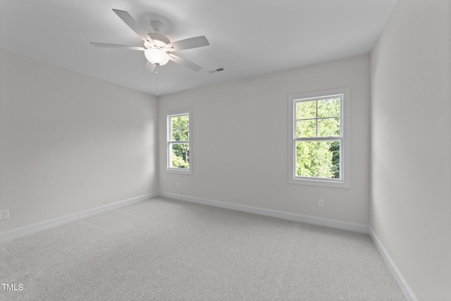 543 Allessandra Dr, Clayton, NC 27527 - empty room featuring healthy amount of natural light, light colored carpet, and a ceiling fan