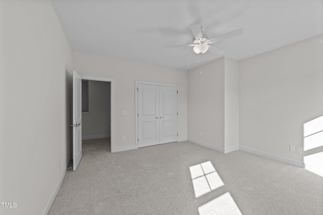 543 Allessandra Dr, Clayton, NC 27527 - unfurnished bedroom with light colored carpet, a closet, and a ceiling fan