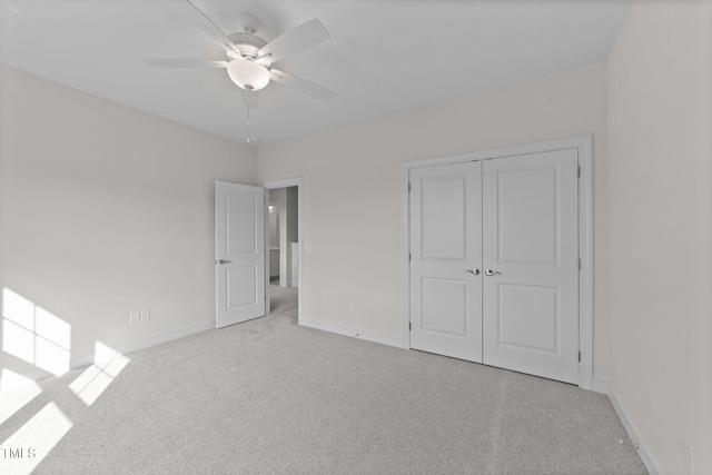 543 Allessandra Dr, Clayton, NC 27527 - unfurnished bedroom with light colored carpet, a closet, and a ceiling fan