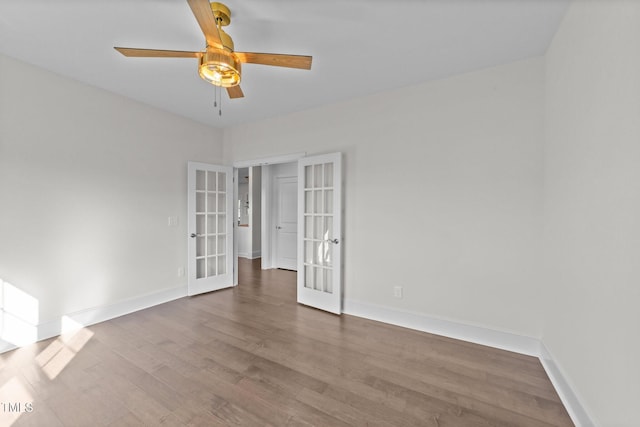 543 Allessandra Dr, Clayton, NC 27527 - unfurnished bedroom with french doors, wood finished floors, and ceiling fan