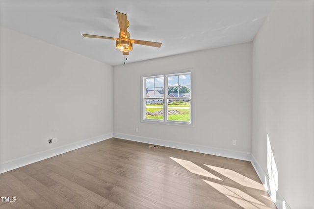 543 Allessandra Dr, Clayton, NC 27527 - spare room with wood finished floors and a ceiling fan