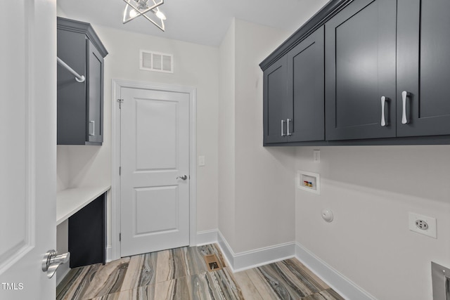 543 Allessandra Dr, Clayton, NC 27527 - washroom featuring cabinet space, electric dryer hookup, washer hookup, and light wood finished floors