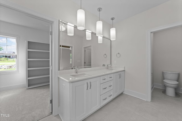 543 Allessandra Dr, Clayton, NC 27527 - full bathroom with double vanity and baseboards