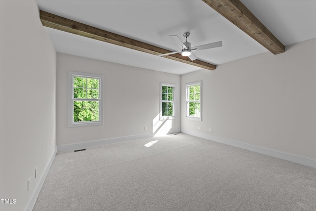 543 Allessandra Dr, Clayton, NC 27527 - spare room with healthy amount of natural light, carpet, beamed ceiling, and a ceiling fan