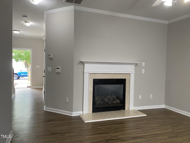 545 Writers Way, Morrisville, NC 27560 - unfurnished living room with dark wood finished floors, ornamental molding, a ceiling fan, and a high end fireplace