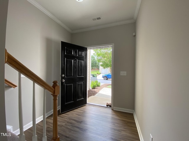 545 Writers Way, Morrisville, NC 27560 - foyer entrance with dark wood finished floors, ornamental molding, and stairway