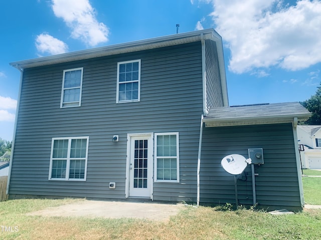5908 Abbington Way, Raleigh, NC 27610 - rear view of house featuring a patio