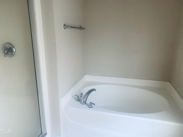 5908 Abbington Way, Raleigh, NC 27610 - full bathroom with a bath and a stall shower