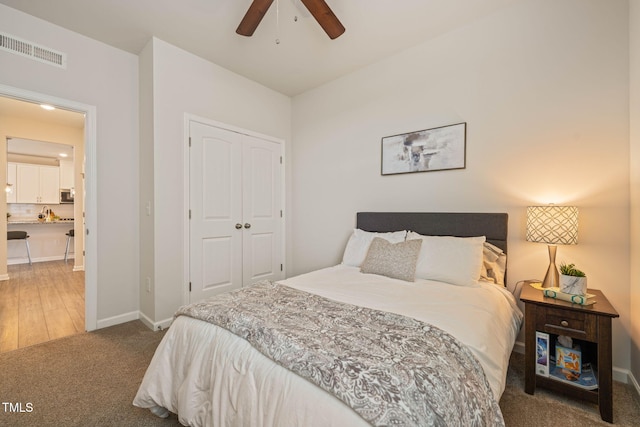 1109 Briar Gate Dr, Holly Springs, NC 27540 - carpeted bedroom with a closet and ceiling fan