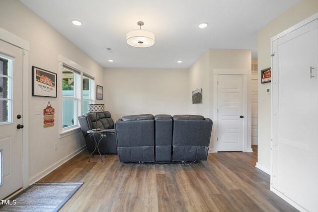 2055 Eva Pearl Dr, Apex, NC 27502 - living area with wood finished floors and recessed lighting