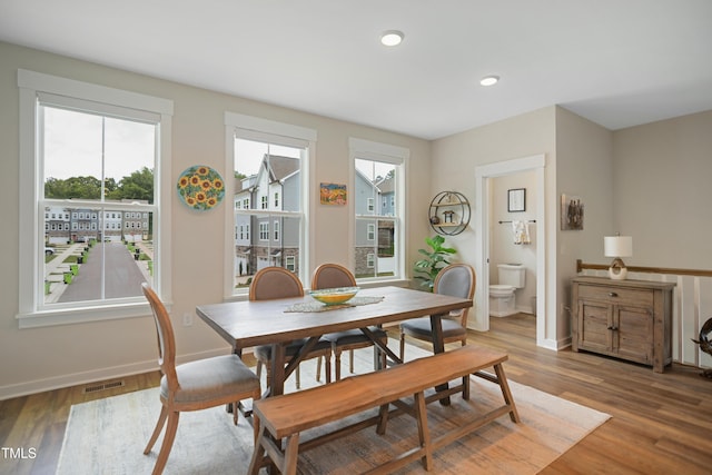2055 Eva Pearl Dr, Apex, NC 27502 - dining space featuring light wood-style flooring and recessed lighting