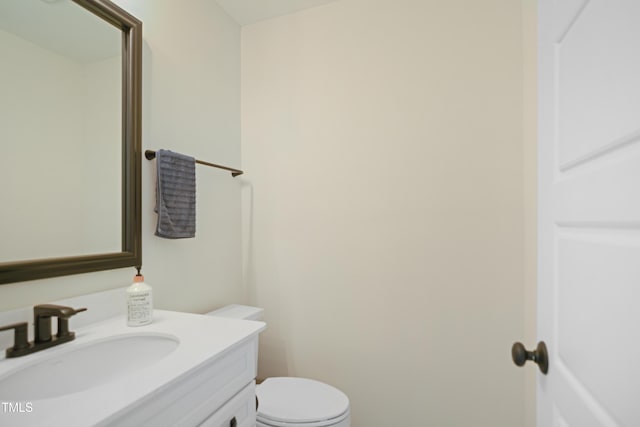 2055 Eva Pearl Dr, Apex, NC 27502 - bathroom featuring toilet and vanity