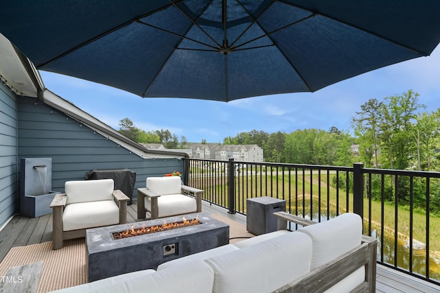 2055 Eva Pearl Dr, Apex, NC 27502 - wooden deck featuring an outdoor living space with a fire pit