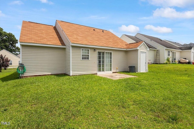 5104 Parkerwood Dr, Knightdale, NC 27545 - back of house featuring a lawn and a shingled roof