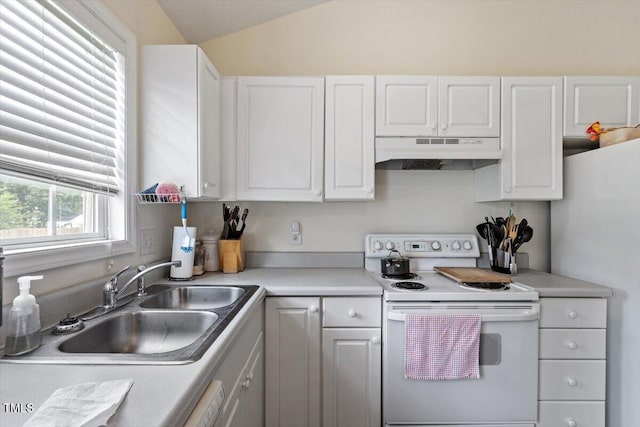 5104 Parkerwood Dr, Knightdale, NC 27545 - kitchen featuring white appliances, under cabinet range hood, white cabinetry, and lofted ceiling