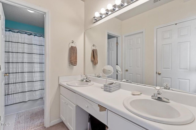5104 Parkerwood Dr, Knightdale, NC 27545 - full bath with double vanity and baseboards