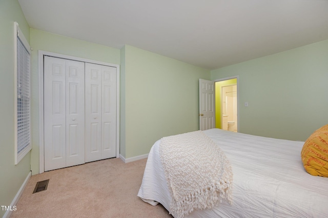 8 Mandy Ct, Durham, NC 27707 - bedroom featuring carpet floors and a closet