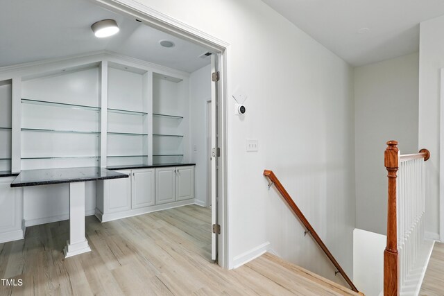 9201 Wooden Rd, Raleigh, NC 27617 - corridor with an upstairs landing, light wood-style flooring, and vaulted ceiling