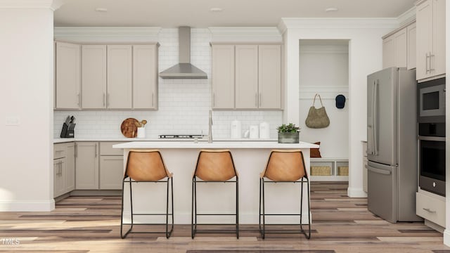 317 Calvander Ln, Apex, NC 27539 - kitchen featuring wall chimney exhaust hood, appliances with stainless steel finishes, light wood-style floors, decorative backsplash, and light countertops