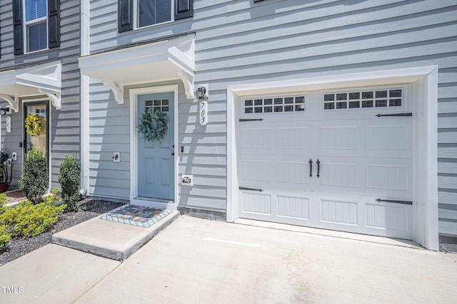 703 Corvette View Knl, Wendell, NC 27591 - property entrance with a garage