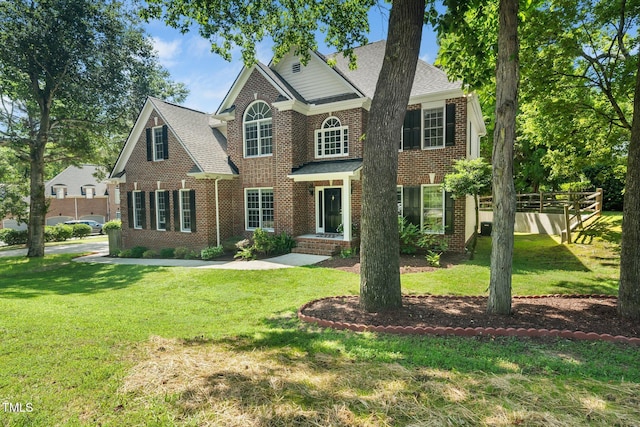 3811 Cottonwood Dr, Durham, NC 27705 - view of front of property featuring brick siding and roof with shingles