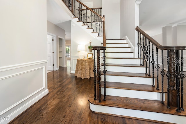 3811 Cottonwood Dr, Durham, NC 27705 - stairs featuring wood finished floors