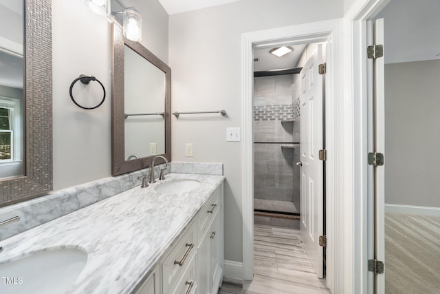 3811 Cottonwood Dr, Durham, NC 27705 - bathroom with double vanity and a stall shower