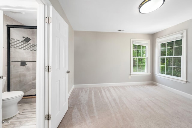 3811 Cottonwood Dr, Durham, NC 27705 - unfurnished bedroom with carpet and ensuite bathroom