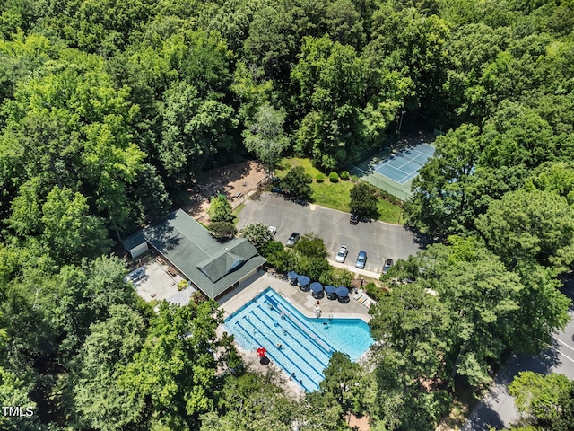 3811 Cottonwood Dr, Durham, NC 27705 - aerial view of a pool area and a heavily wooded area