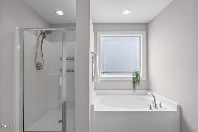 1214 Valley Dale Dr, Fuquay Varina, NC 27526 - bathroom with a stall shower and a garden tub
