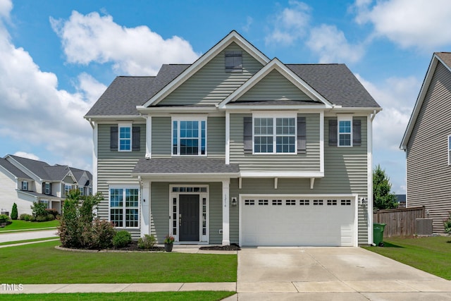 1214 Valley Dale Dr, Fuquay Varina, NC 27526 - view of front of property featuring concrete driveway, an attached garage, and roof with shingles