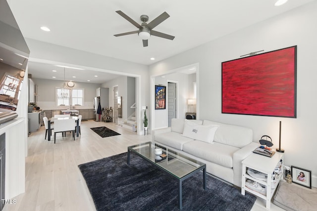 1008 Whistler St, Durham, NC 27713 - living room with stairway, light wood-style floors, ceiling fan, and recessed lighting