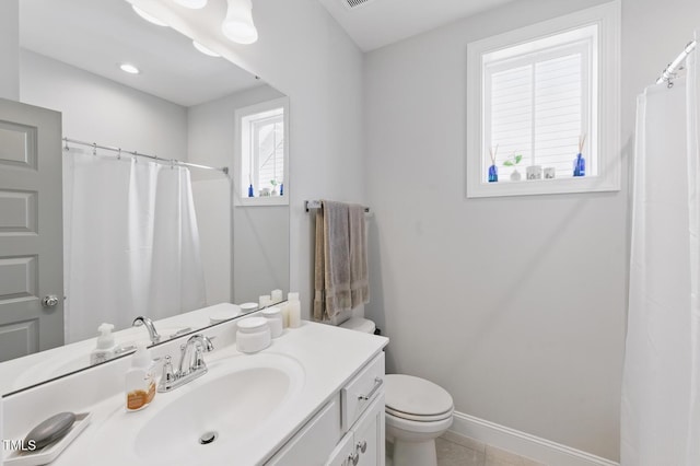 1008 Whistler St, Durham, NC 27713 - full bath with vanity, curtained shower, and tile patterned floors