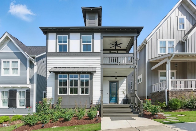 1008 Whistler St, Durham, NC 27713 - view of front of home with a balcony, board and batten siding, and a ceiling fan