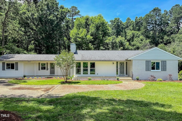 303 Winhaven St, Roxboro, NC 27573 - ranch-style home with a chimney and a front yard