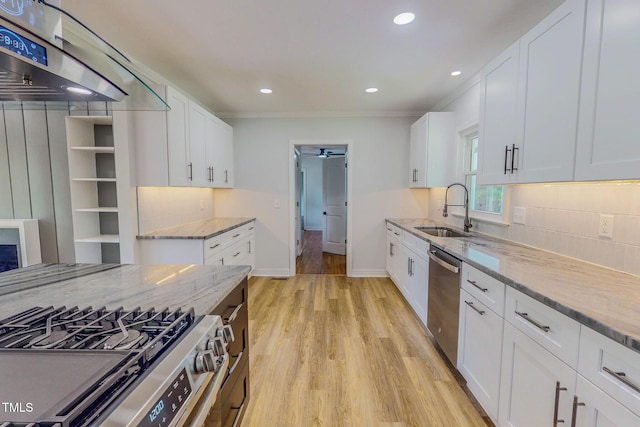 303 Winhaven St, Roxboro, NC 27573 - kitchen with appliances with stainless steel finishes, light stone counters, tasteful backsplash, range hood, and recessed lighting