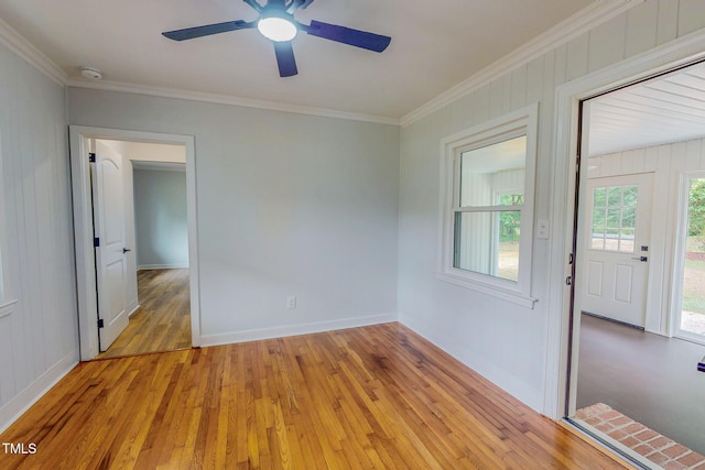 303 Winhaven St, Roxboro, NC 27573 - spare room with crown molding, light wood-style flooring, a ceiling fan, and a smoke detector