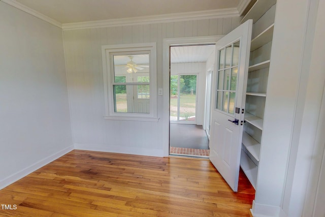 303 Winhaven St, Roxboro, NC 27573 - unfurnished room featuring ornamental molding and light wood-type flooring