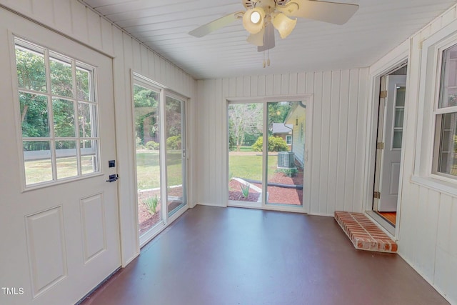 303 Winhaven St, Roxboro, NC 27573 - unfurnished sunroom featuring finished concrete flooring