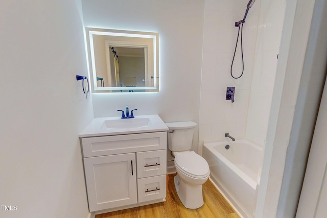 303 Winhaven St, Roxboro, NC 27573 - bathroom featuring vanity, wood finished floors, and shower / tub combination